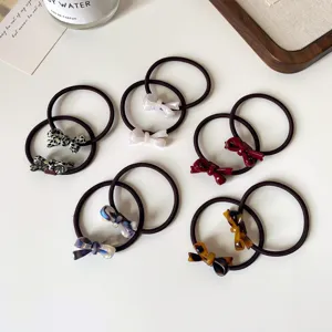 Set di elastici per capelli con fiocco per donna, pratici fermacapelli eleganti.