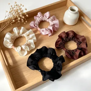 Elegant satin scrunchies set in four chic colors, soft elastic hair ties for women and girls.