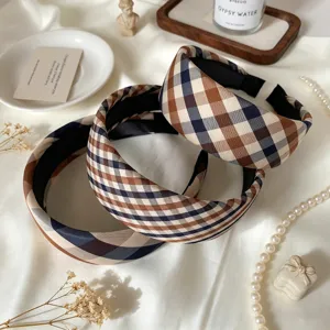 Stylish plaid headband for women, retro brown and blue checkered wide hair hoop accessory.