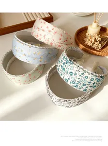 Detailed view of sweet floral print wide headbands, pastoral style sweet hair accessories.