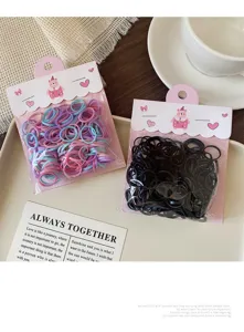 Disposable elastic hair bands for kids, small thick rubber ties, colorful and black bags.