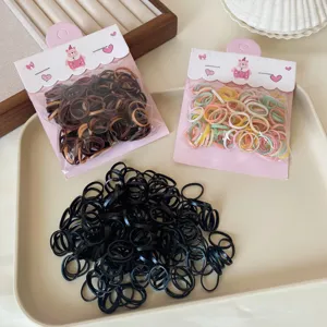 Kids disposable hair ties, small elastic rubber bands in bags and bulk, gentle on hair.