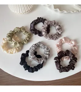 Satin hair scrunchies detail, elegant solid color elastic hair ties set for daily styling.