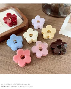 Small flower hair claw clip for women, cute resin mini hair jaw clips for half up hairstyles.