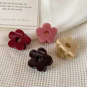 Small floral hair claw clips set, cute resin shark clips for women and half up hairstyles.