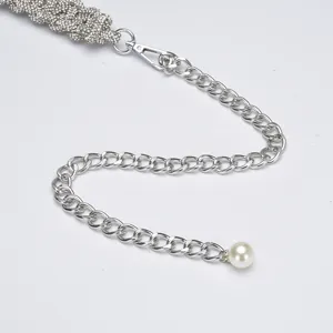 Exquisite rhinestone braided waist chain with metal links and pearl pendant for dresses.