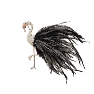 Stunning rhinestone flamingo brooch featuring soft black feathers for chic apparel.