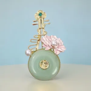 Chinese style pipa brooch detail, retro jade ring and pink flower decor for hanfu.
