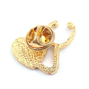 Gold tone alloy medical stethoscope brooch pin back detail closeup view accessory