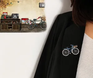 Vintage blue bicycle brooch with sparkling rhinestones, elegant alloy pin for women fashion.