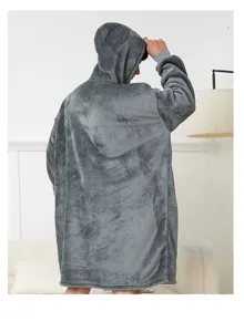 Cozy grey flannel wearable blanket hoodie detail view, showing soft texture and relaxed fit.