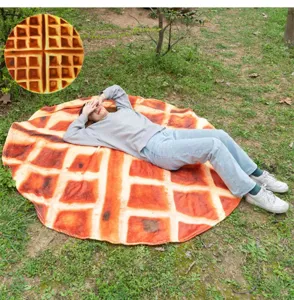Couverture ronde creative a motif de gaufre pour interieur cosy et pique-nique.