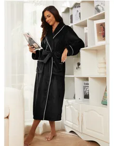 Long black flannel fleece bathrobe for women, cozy winter sleepwear with belt and pockets.