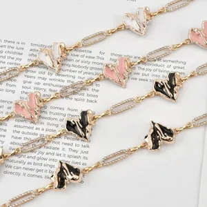 Chic metal waist chain with cute heart charms and sparkling rhinestones for women dresses.