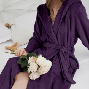 Women long plush flannel hooded bathrobe in dark purple, cozy winter sleepwear loungewear.