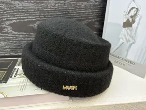 Stylish winter wool knitted docker cap for men and women, warm thick casual roll brim hat.