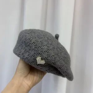 Grey knitted pearl heart beret hat, vintage warm winter women painter hat detail view.
