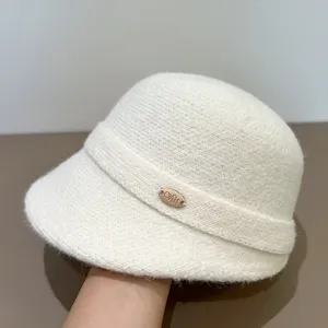 Women's retro knitted bucket hat detail, wide brim winter warm basin hat in off-white.