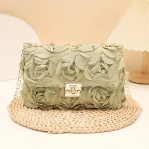 Light green floral shoulder bag with chain strap, stylish clutch for women, spring fashion.