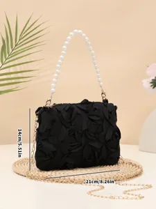 Black 3D rose evening handbag with elegant pearl top handle and gold chain strap for women.