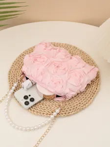 Pink rose floral clutch bag with pearl chain strap, elegant evening shoulder crossbody bag.