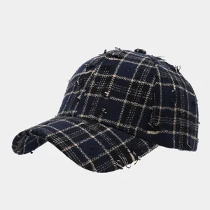 Vintage distressed plaid baseball cap with frayed edges, stylish streetwear hat for daily wear.