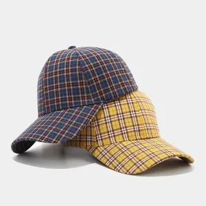 Detail view of classic plaid baseball cap featuring blue and yellow checkered fabric design.