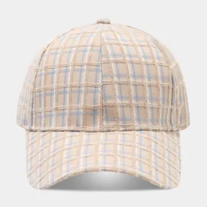Detailed view of the vintage color-blocking plaid baseball hat, stylish and cozy texture.