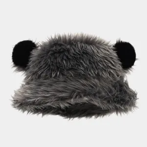 Close-up detail of the fluffy grey bucket hat featuring cute black bear ears and plush fabric.