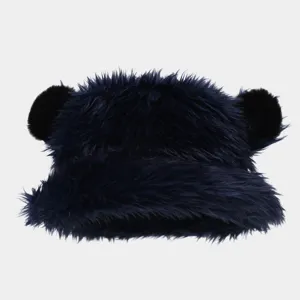 Detail view of a winter plush bear ear bucket hat, thick faux fur warm cap for outdoor travel.