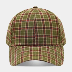 Green plaid baseball cap detail view, featuring classic vintage tartan fabric and structured fit.