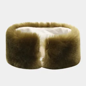 Detailed view of fluffy olive green faux fur wide headband, winter warm ear protector.