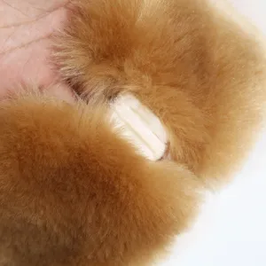 Brown plush wide headband detail showing soft furry texture and inner warm lining design.