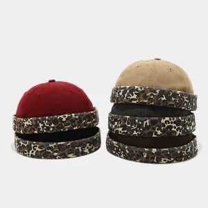 Retro leopard print colorblock docker cap, unisex stylish streetwear skull cap details.