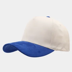 Close-up detail of the stylish two-tone baseball cap featuring soft blue suede brim and beige crown.