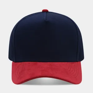 Front detail of navy blue and red suede 5-panel trucker baseball cap with color block design.