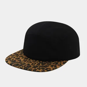 Leopard print brim and solid black five-panel flat cap design, modern hip-hop streetwear style.