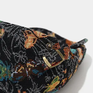 Retro butterfly jacquard ivy cap detail view, ethnic woven painter hat with adjustable metal buckle.