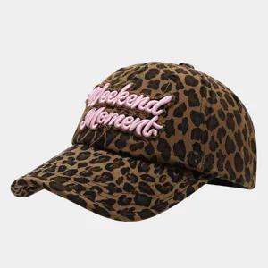 Stylish leopard print baseball cap with pink embroidered text detail for women street style daily wear.