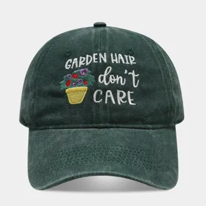 Vintage washed dark green dad hat featuring cute garden hair dont care embroidery design.