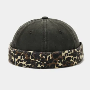 Close-up detail of the vintage leopard print brim docker cap, stylish brimless design.