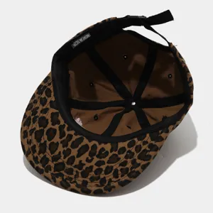 Leopard print baseball hat interior detail view, adjustable strap, casual streetwear style.
