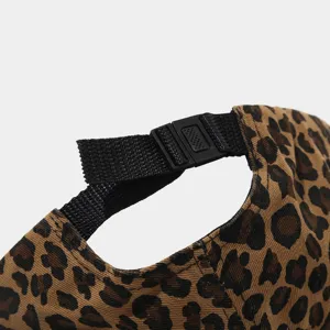 Leopard print baseball cap adjustable strap detail, durable plastic buckle and black webbing.