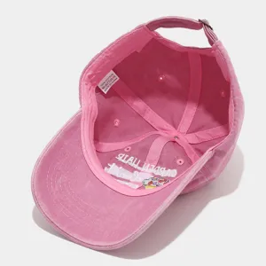Pink washed dad hat, cotton baseball cap with inner embroidery and breathable eyelets for outdoor wear.