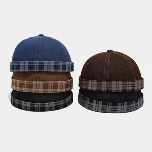 Retro plaid denim docker hat showcasing multi-color stacking design for street fashion apparel.