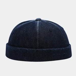 Classic washed denim docker hat detail view, premium cotton fabric, retro brimless design.
