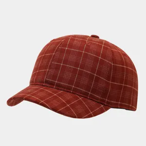 Retro plaid short brim baseball cap for men and women, stylish casual outdoor sun hat.