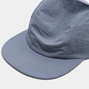 Breathable mesh detail of slate blue summer outdoor quick dry 5-panel running cap.