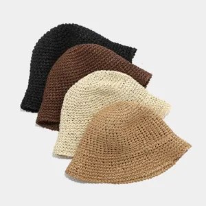 Summer hollow woven straw bucket hat for women, breathable beach sun basin hat in solid colors.