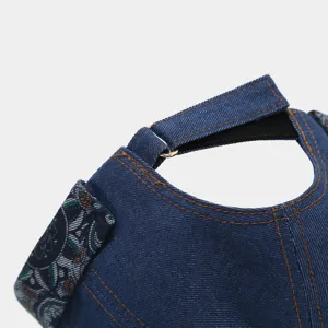 Denim docker cap detail shot, retro washed blue sailor hat with adjustable metal buckle.